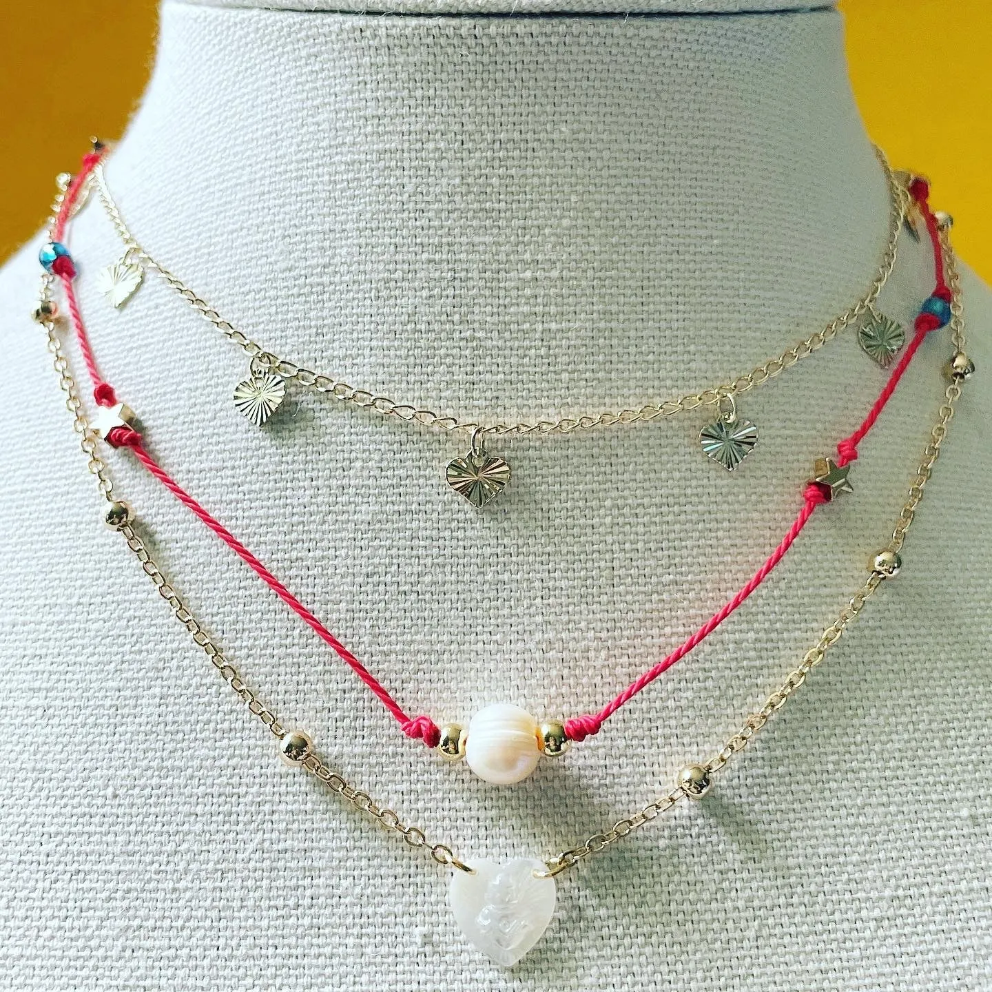 Red string  pearl necklace