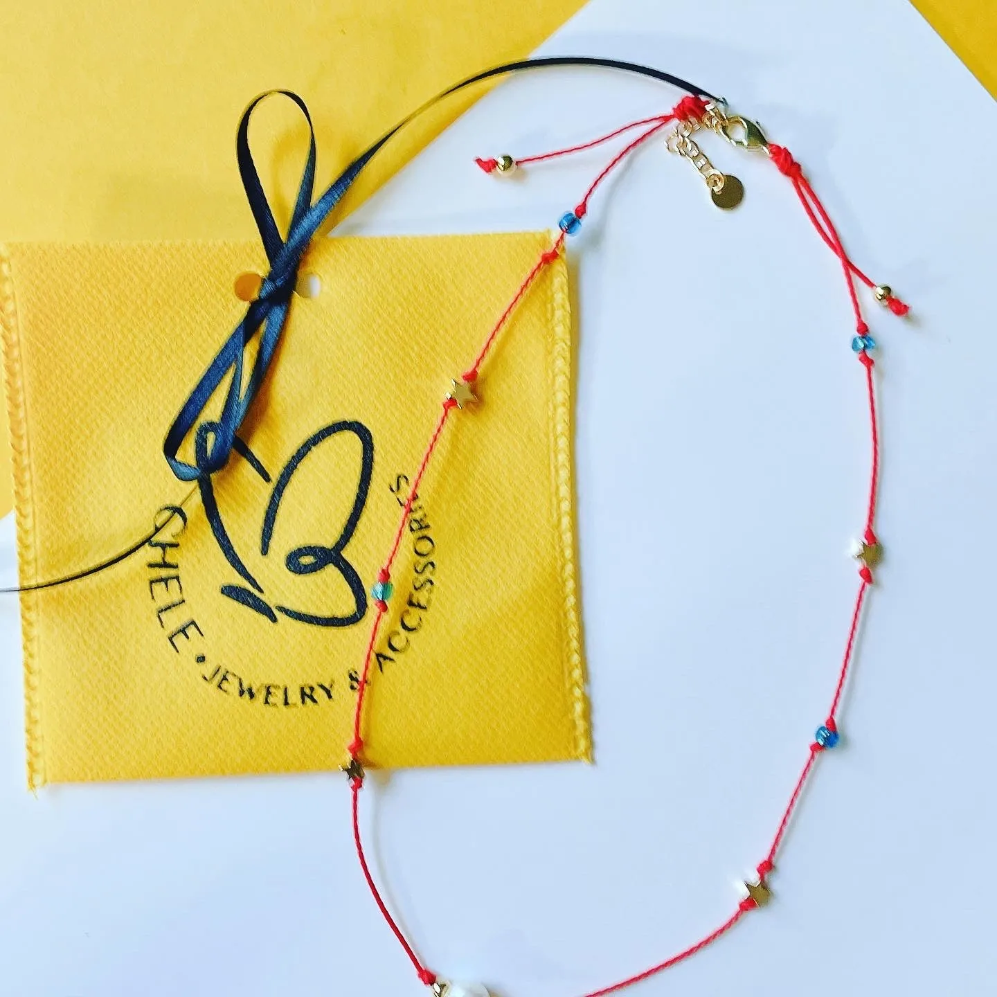 Red string  pearl necklace