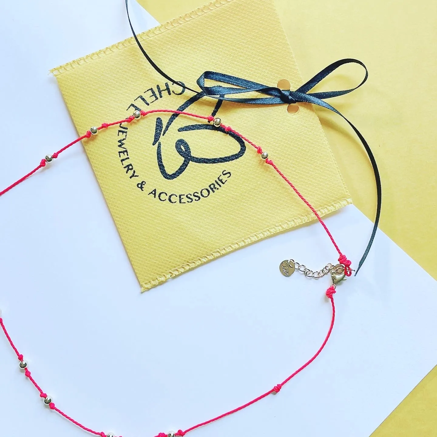 Red string  pearl necklace